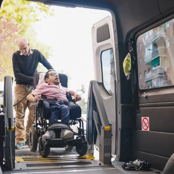 Wheelchair transportation imagery accompanying accessible pickup and medical appointment planning